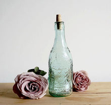 Three gorgeous antique glass stoppered bottles, one from each part of Great Britain.