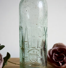 Three gorgeous antique glass stoppered bottles, one from each part of Great Britain.