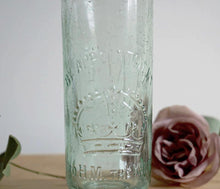 Three gorgeous antique glass stoppered bottles, one from each part of Great Britain.