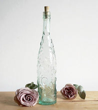 Three gorgeous antique glass stoppered bottles, one from each part of Great Britain.