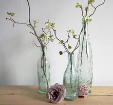 Three gorgeous antique glass stoppered bottles, one from each part of Great Britain.