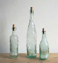 Three gorgeous antique glass stoppered bottles, one from each part of Great Britain.