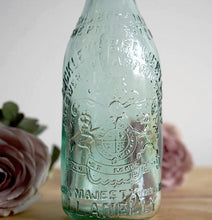 Three gorgeous antique glass stoppered bottles, one from each part of Great Britain.