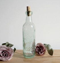 Three gorgeous antique glass stoppered bottles, one from each part of Great Britain.