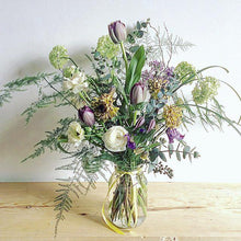 bouquet full of spring flowers and foliage