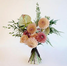 Peach, pinky orange and green summer bouquet